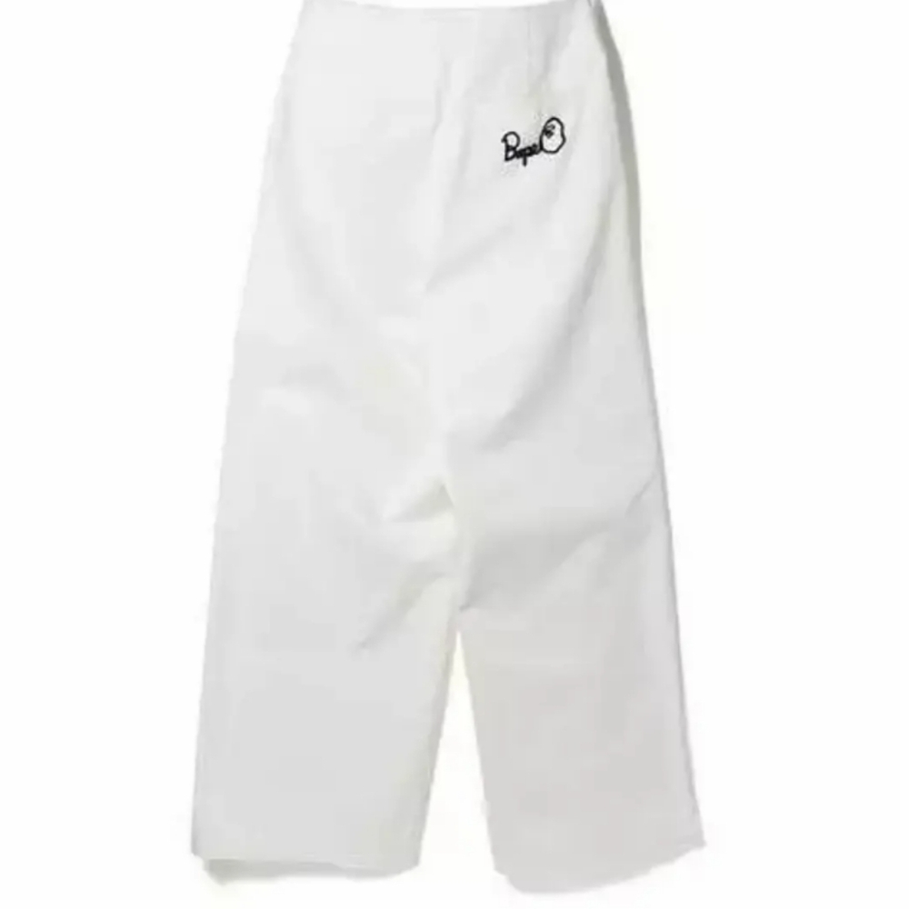 White Wide-Leg Pants with Black Buttons - Picture 4 of 5